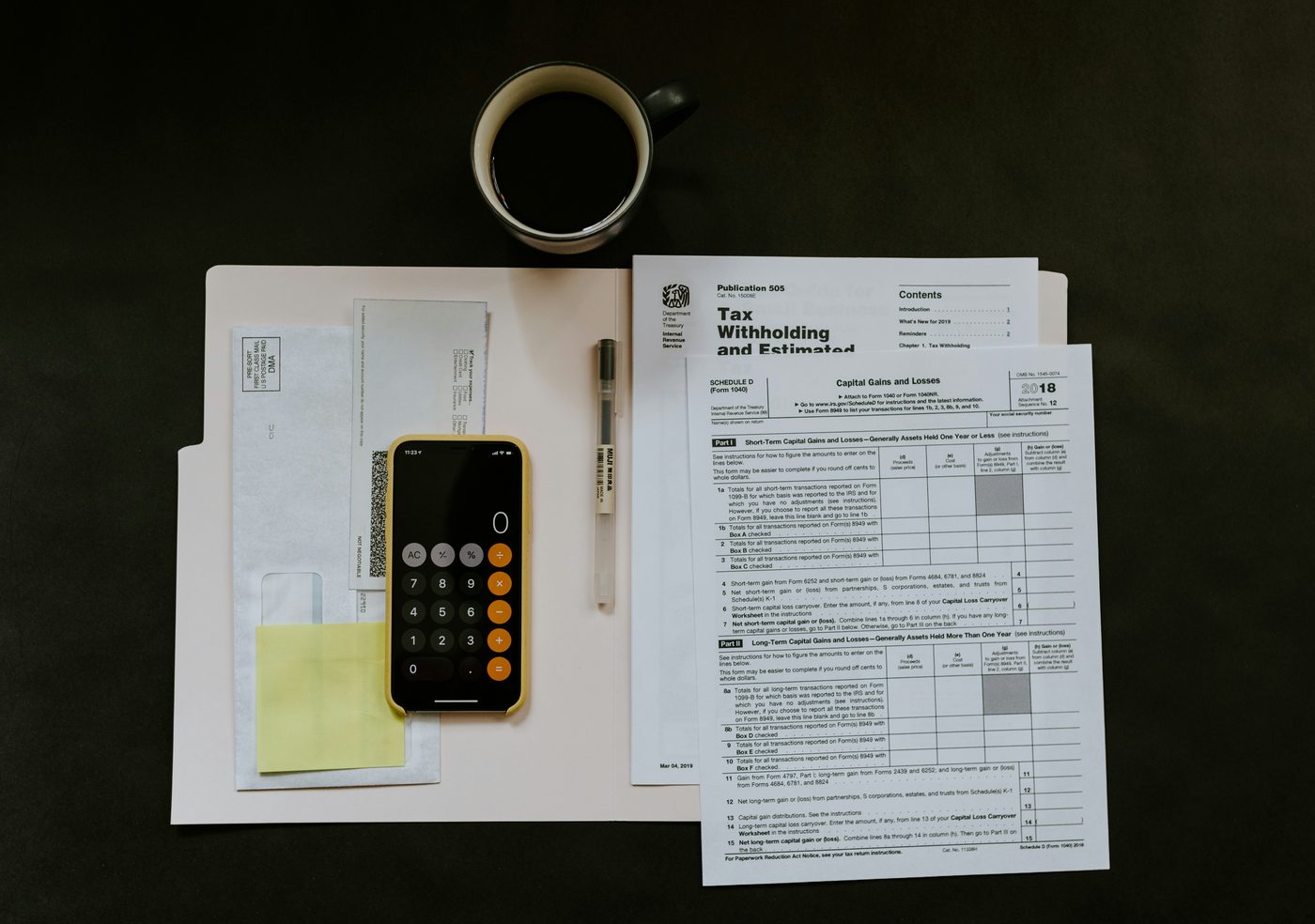 Tax return documents and calculator